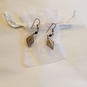 Gray and black beaded earrings.